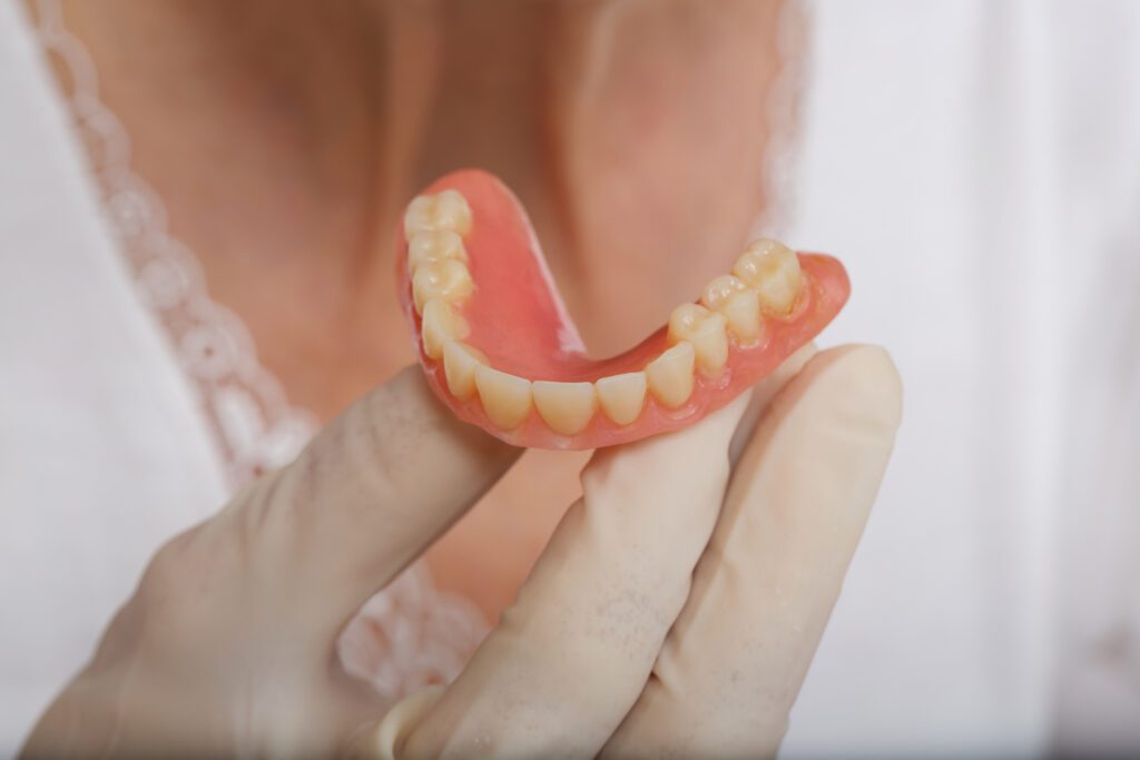 Dental Implants versus Dentures in Plano TX